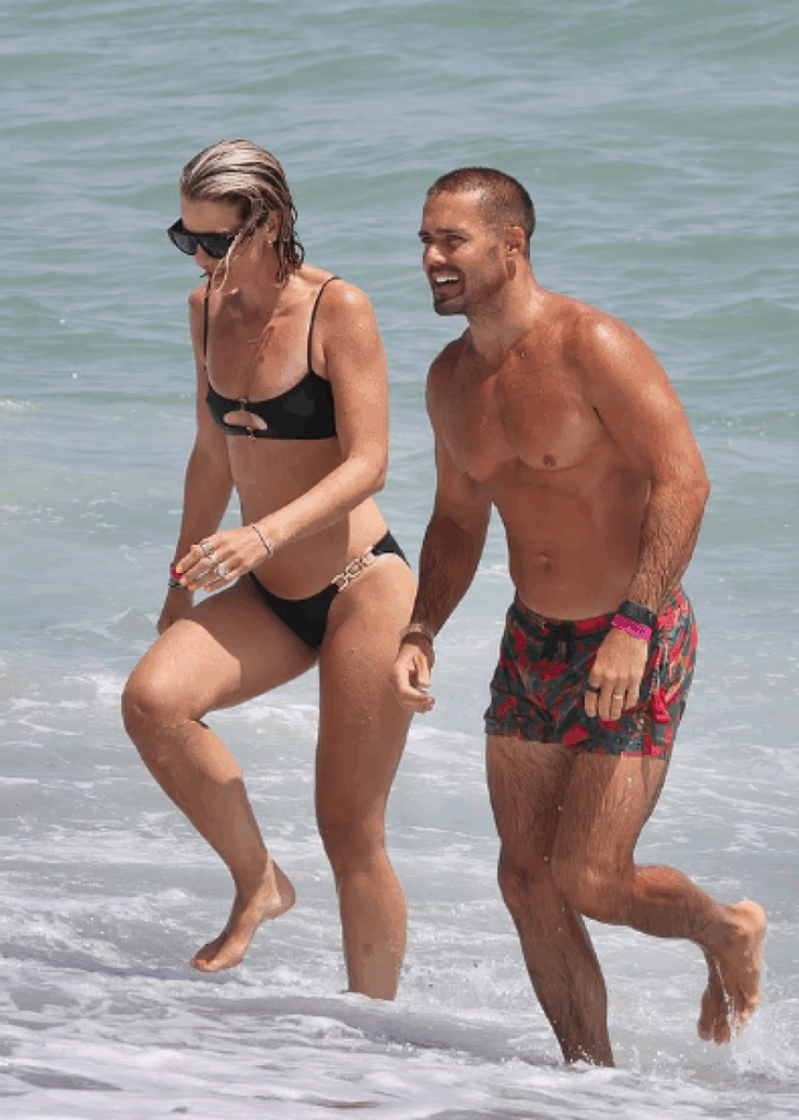 vogue williams shfaqet mahnitese ne bikini teksa shkemben perqafime dhe puthje me burrin e saj 68914dc5d86ce